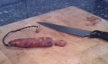Chopping Chorizo sausage